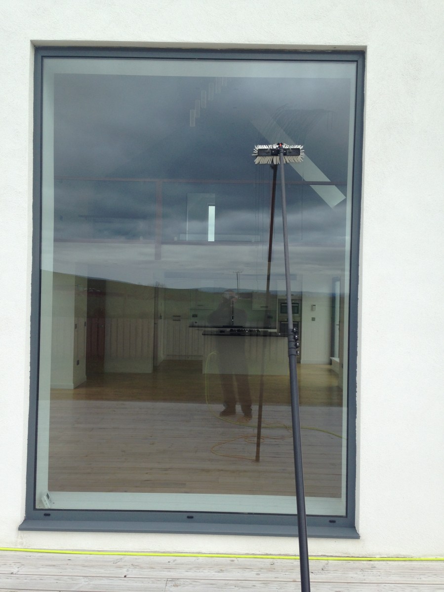 Window with cleaning pole